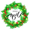 Joyeux Noel French Merry Christmas holiday hand drawn calligraphy text greeting and holly wreath decoration for card design templa Royalty Free Stock Photo