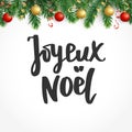 Joyeux noel text. Holiday greetings french quote. Fir tree branches and baubles. Great for Christmas cards, gift tags Royalty Free Stock Photo