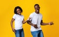 Joyful african american lovers having fun together, moving and screaming Royalty Free Stock Photo