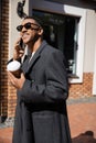 joyful african american man in coat Royalty Free Stock Photo