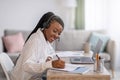 Joyful african american woman attending online course Royalty Free Stock Photo