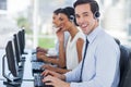 Joyful agent working in a call centre Royalty Free Stock Photo