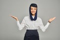 joyful arabian airlines stewardess in headscarf Royalty Free Stock Photo