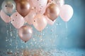 A joyful arrangement of pink and gold balloons adorned with confetti, adding a colorful touch to any celebratory setting, gender