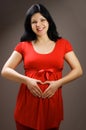 Joyful beautiful pregnant woman