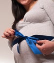 Joyful beautiful pregnant woman expecting baby boy Royalty Free Stock Photo
