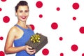 Joyful beautiful young woman with Christmas gift boxes, holding gifts. portrait of brunette girl. Royalty Free Stock Photo