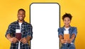 Joyful Black Couple Showing Travel Tickets Posing Over Big Phone Royalty Free Stock Photo