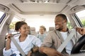 Joyful Black Family Riding New Car Enjoying Road Trip Together Royalty Free Stock Photo