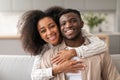 Joyful Black Wife Hugging Husband From Back At Home Royalty Free Stock Photo
