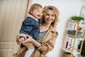 joyful blonde woman with wavy hair