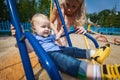 Joyful boy on swing Royalty Free Stock Photo