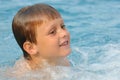 Joyful boy in water Royalty Free Stock Photo