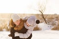 Teens brother and sister having fun snow in winter Royalty Free Stock Photo