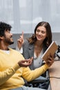 joyful brunette woman in grey blazer Royalty Free Stock Photo