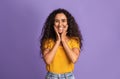 Joyful Brunette Woman Touching Face In Happy Excitement And Looking At Camera