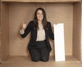 Joyful business woman with copy space sitting in her own office Royalty Free Stock Photo