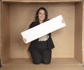 Joyful business woman with copy space sitting in her own office Royalty Free Stock Photo