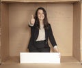 Joyful business woman with copy space sitting in her own office Royalty Free Stock Photo