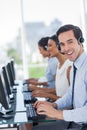 Joyful call centre agent working Royalty Free Stock Photo