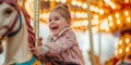 A Joyful Child Brimming With Excitement As She Enjoys A Vibrant Carousel