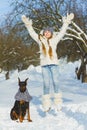 Joyful children playing in snow. Two happy girls having fun outside winter day Royalty Free Stock Photo