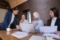 Joyful colleagues working on project together Royalty Free Stock Photo