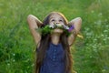 Joyful cute little girl on the summer meadow Royalty Free Stock Photo