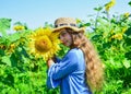 Joyful day. child in field of yellow flowers. teen girl in sunflower field. concept of summer vacation. rich harvest and