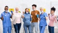 Joyful Diverse Coronavirus Vaccinated Patients And Doctors Standing In Hospital
