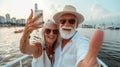 Joyful elderly european couple taking selfie on vacation with blurred downtown background