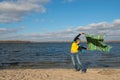 Joyful expressive woman having fun, catches the wind, playing wi Royalty Free Stock Photo