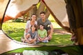 Joyful family camping in the park Royalty Free Stock Photo