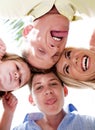 Joyful family making weird faces in huddle Royalty Free Stock Photo