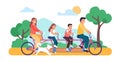 Joyful family rides together on tandem. Parents and kids on bicycle. City transportation. Young people walking with dog Royalty Free Stock Photo