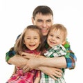 Joyful father hugging his son and daughter Royalty Free Stock Photo