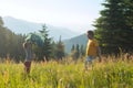 Joyful father and son are playing and having fun on the alpine m Royalty Free Stock Photo