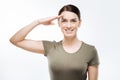 Joyful female soldier saluting the commander Royalty Free Stock Photo