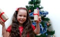 Joyful girl five years old received a gift. Blurry, defocused, selective focus