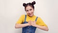 Joyful girl laughing in studio. Glad asian lady touching her face on white background