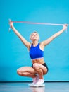 Joyful girl standing on bathroom scales Royalty Free Stock Photo