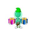 A joyful green streptococcus pneumoniae mascot design style with Christmas gifts