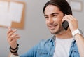 Joyful handsome man talking on cell phone Royalty Free Stock Photo