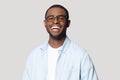 Joyful happy african american young man in eyeglasses portrait. Royalty Free Stock Photo