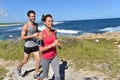 Joyful joggers running on a beautiful summer day