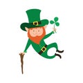 Joyful jumping leprechaun with clover in his hand.