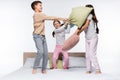 joyful kids having pillow fight while Royalty Free Stock Photo