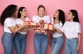 Joyful Ladies Giving Gifts Boxes To Female Friend, Pink Background