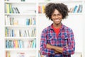 Joyful laughing african american young adult man