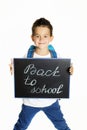 Joyful little boy with backpack ready for school Royalty Free Stock Photo